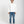 Load image into Gallery viewer, Short Man wearing a white sweater and blue jeans on a white background