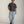 Load image into Gallery viewer, Shorter Man wearing a gray t-shirt and light blue jeans on a plain background
