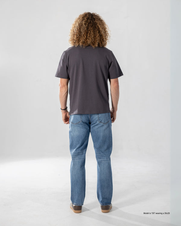 medium dark straight jeans for short men back - muscular body type
